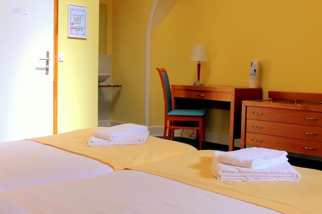 Le Cenacle Hotel Genebra Quarto foto